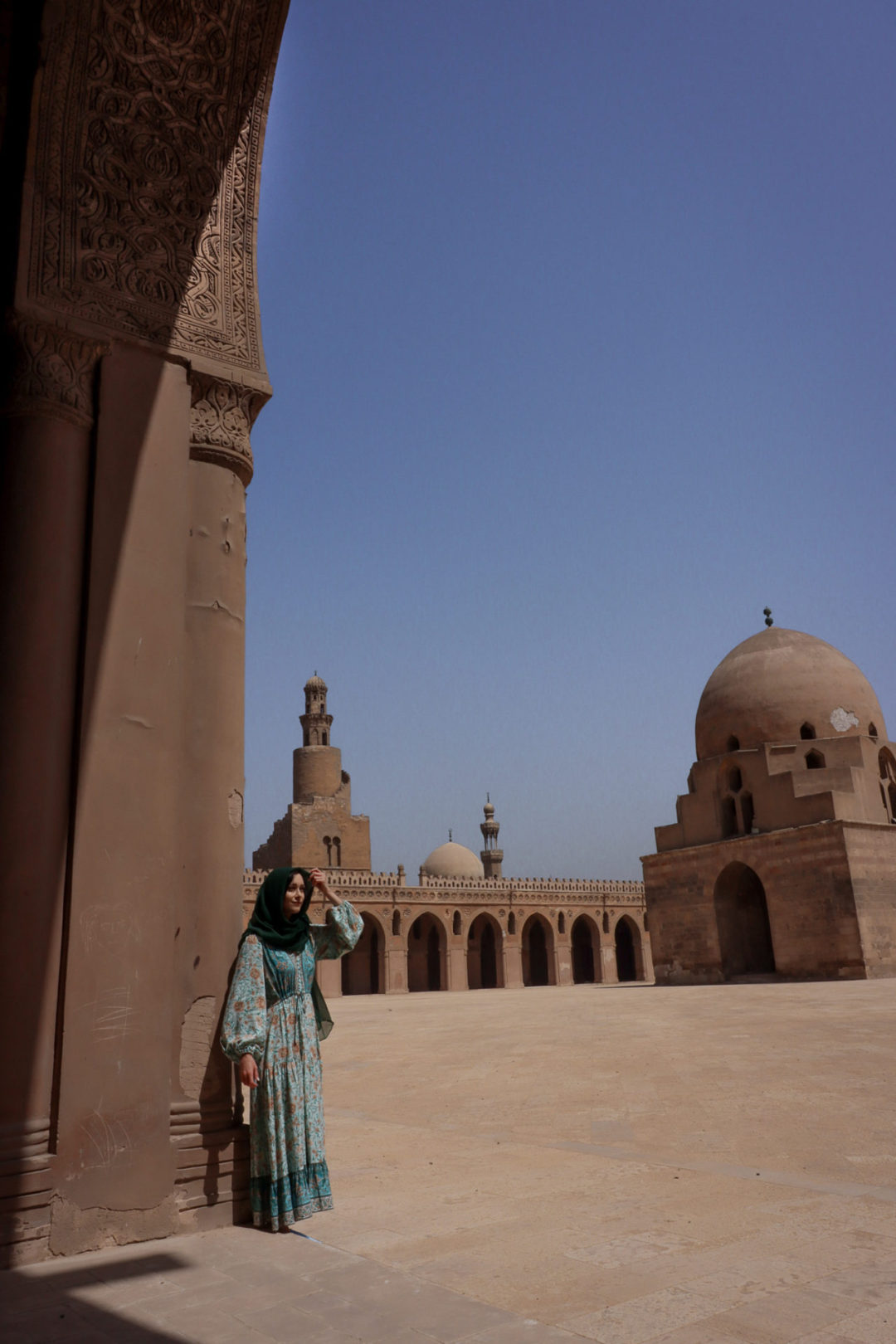 Solo Female Traveler at the Mosque of Ibn Tulun in Cairo, Egypt