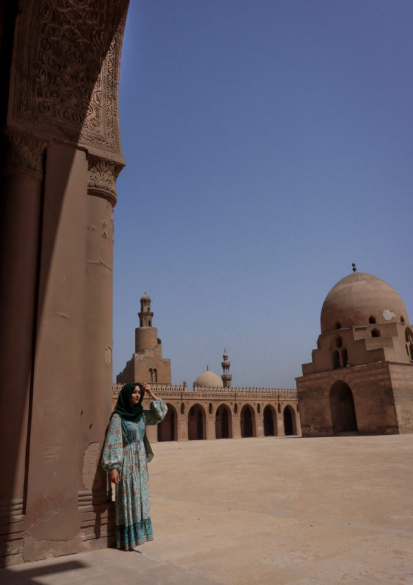 Solo Female Traveler at the Mosque of Ibn Tulun in Cairo, Egypt