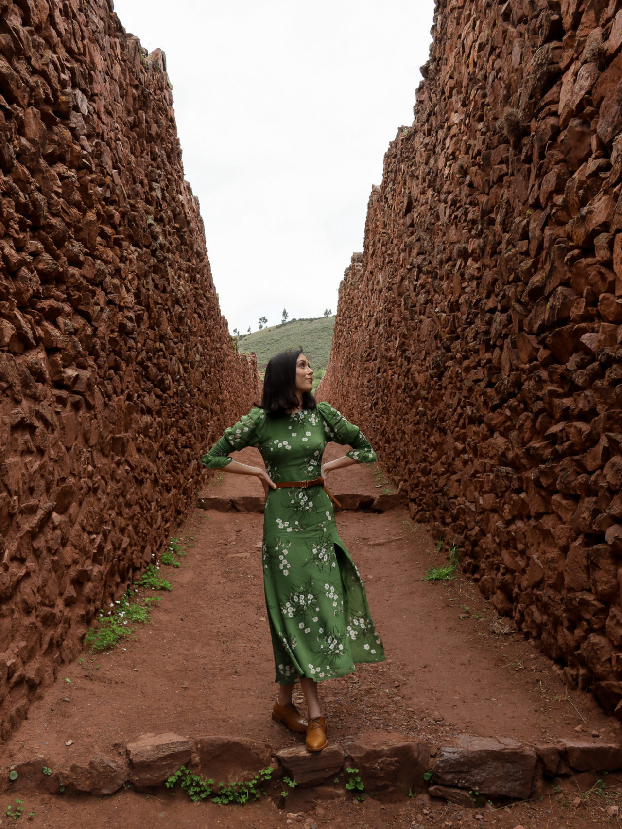Travel Blogger Jordan Gassner standing on one of the many ancient "highways" at the Wari Culture archeological site, Pikillacta.