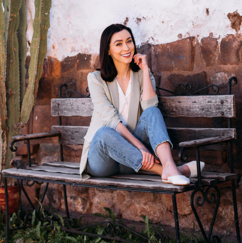 Jordan Gassner Smiling on a Bench in San Blas, Cusco, Peru