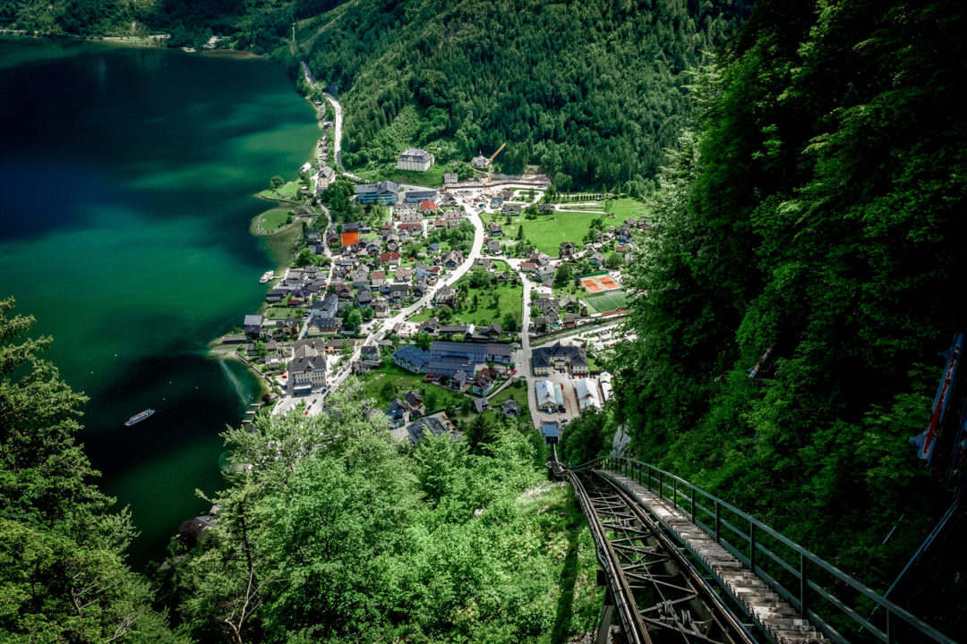 High angle shot of the top of the funicular looking fown on the village below at Lake Hallstatt in Austria
