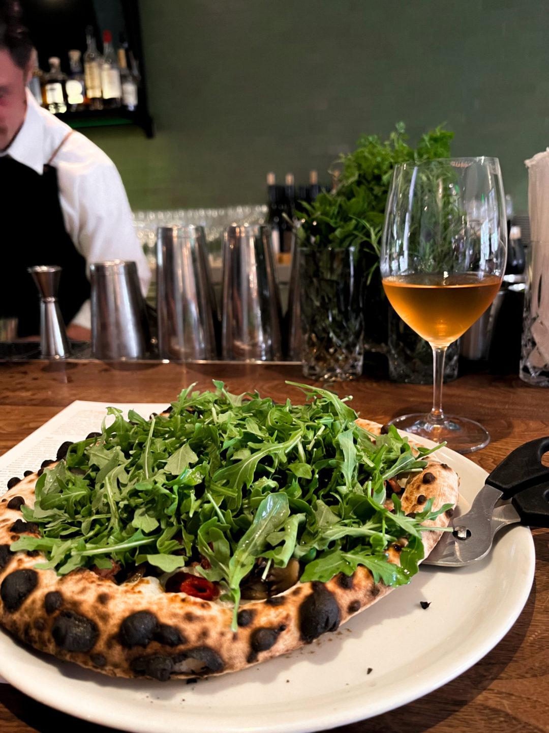 The Wild Mushroom Pizza and a Glass of Orange Wine from Farm Shop in Larkspur, a one of the best restaurants in Marin County
