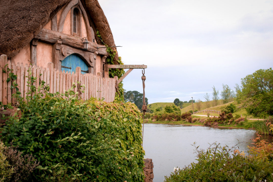 The mill overlooking the lake in Hobbiton New Zealand