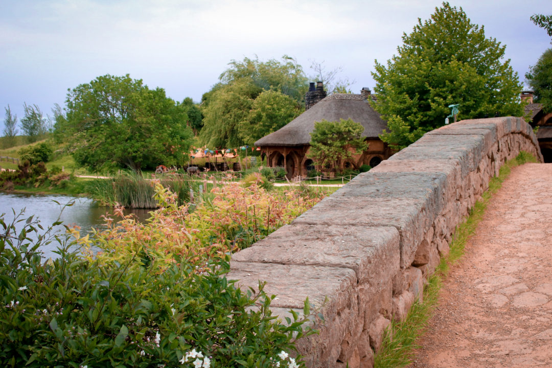 The Green Dragon Inn from across the Mill bridge in Hobbiton New Zealand