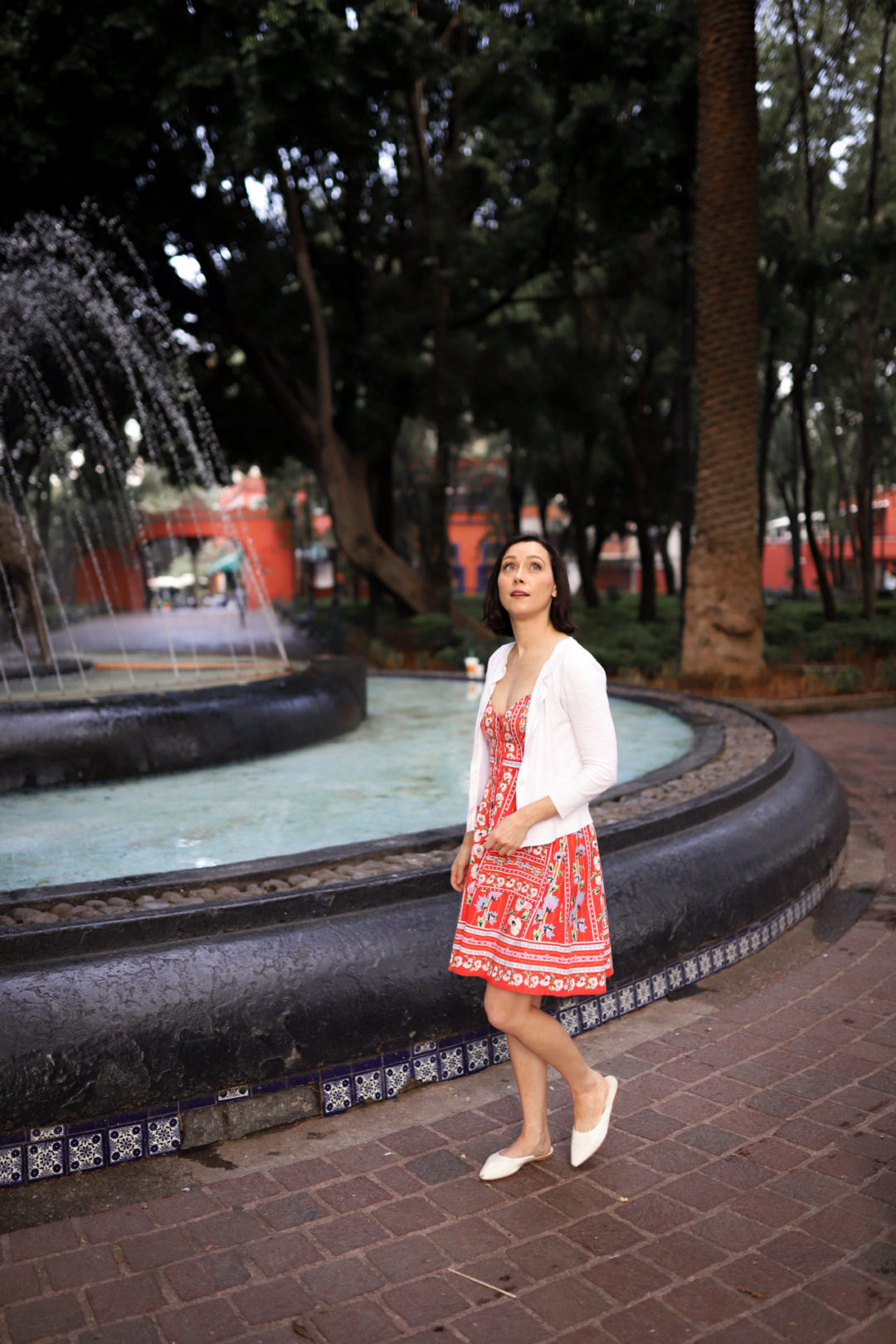 Travel Blogger Jordan Gassner walking near Fuente de los Coyotes in Jardín Centenario in Coyoacán Mexico City