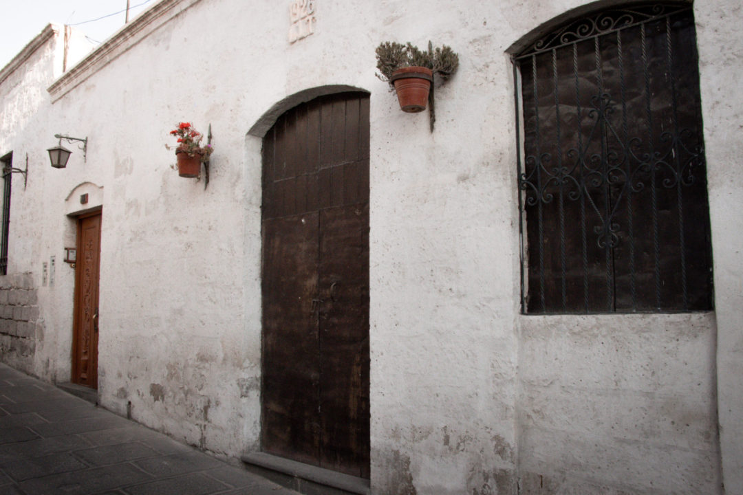 An old white house made sillar in Arequipa's Barrio de San Lázaro