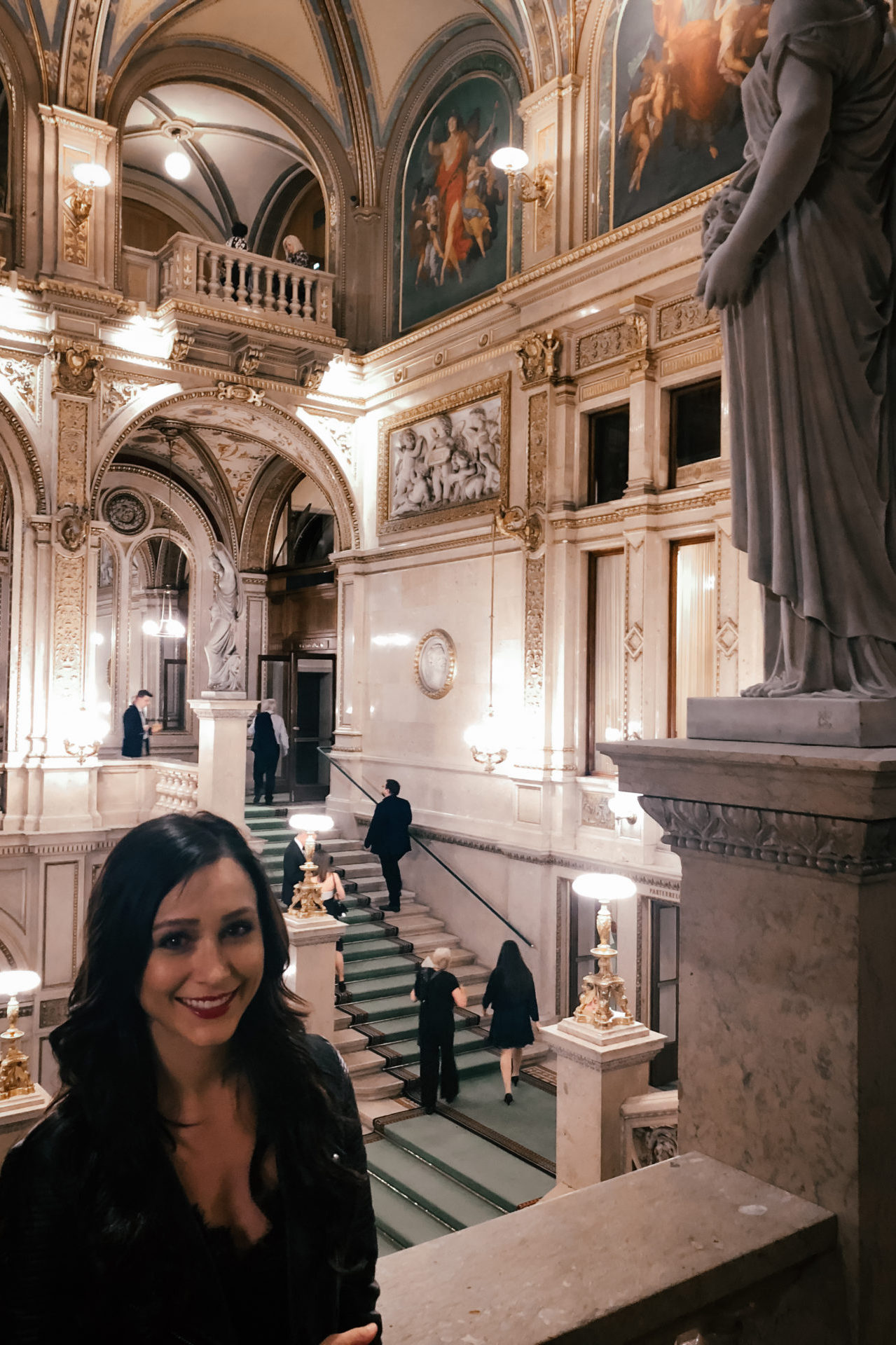 Travel Blogger Jordan Gassner inside the Vienna State Opera before the start of a show