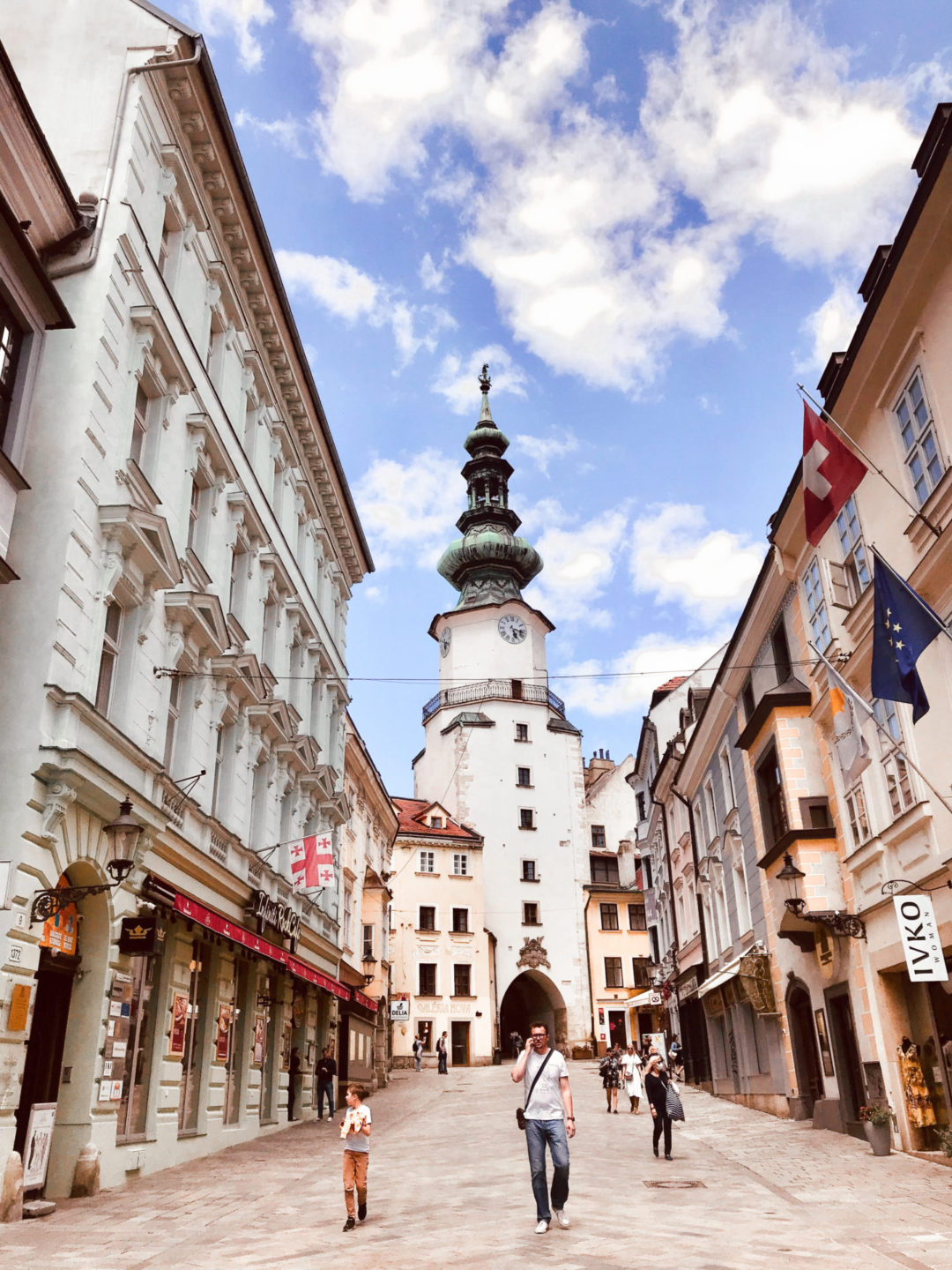 Bratislava Travel Guide: An almost empty street leading up to the Michael's Gate tower in Old Town