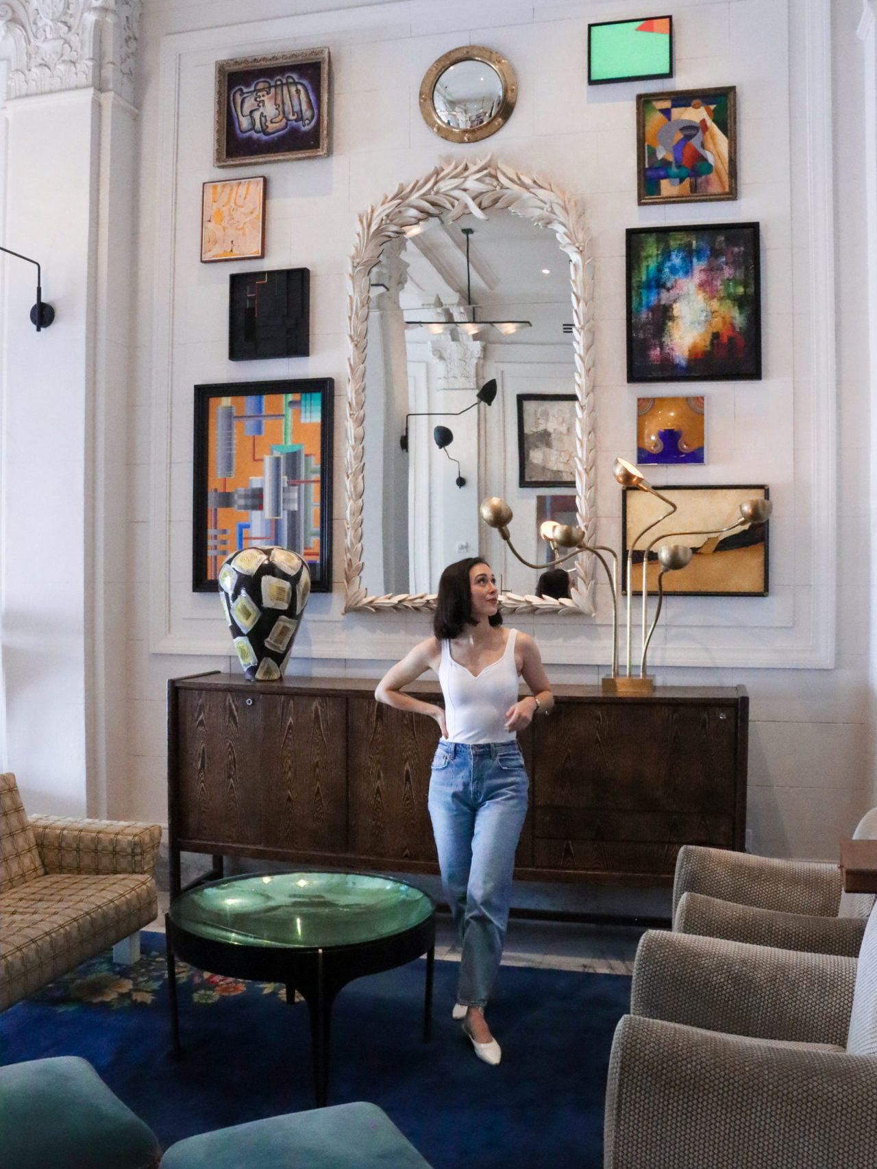 Travel Blogger Jordan Gassner admiring the artwork in the Kelly Wearstler designed San Francisco Proper Hotel Lobby