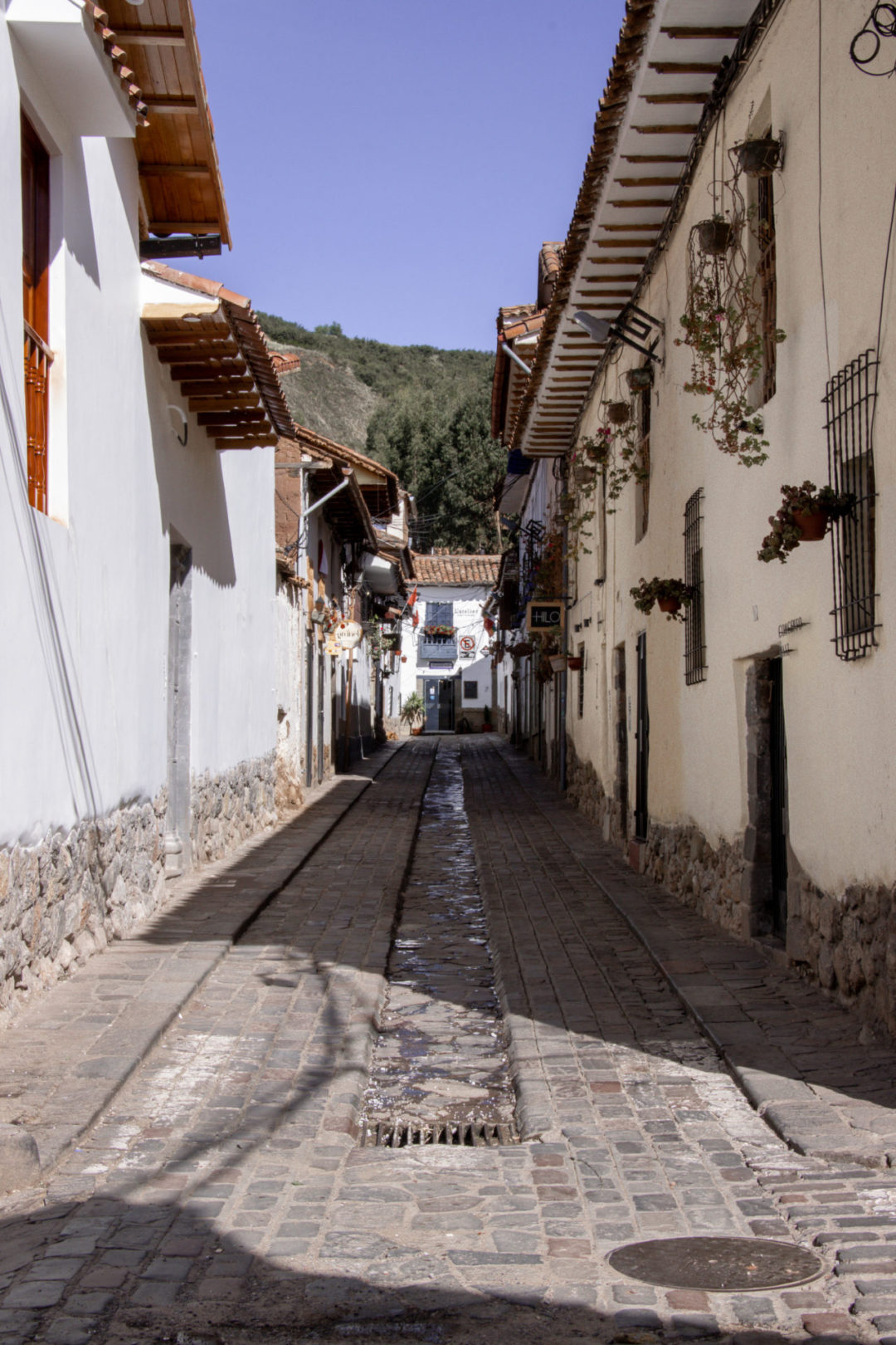 The view toward L'Atelier Cafe Concept up Calle Carmen Alto in Cusco, Peru