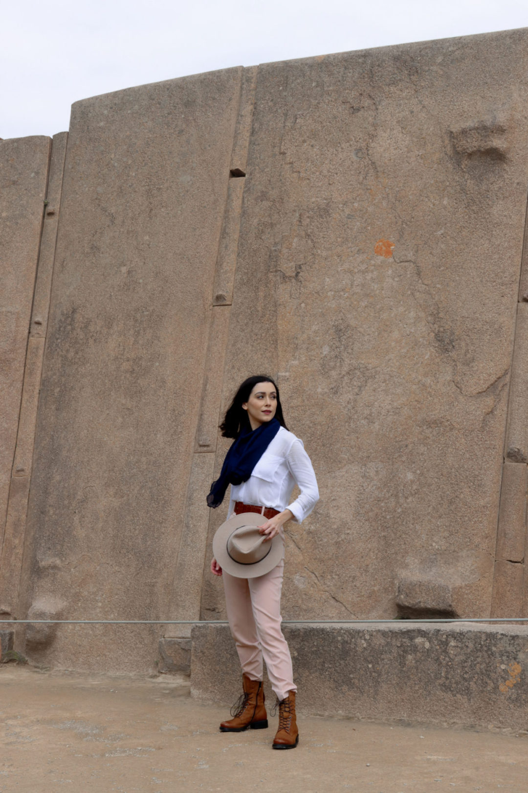 Travel Blogger Jordan Gassner dressed as Brenden Fraser from the Mummy while standing in front of Templo del Sol in the Ollantaytambo Ruins