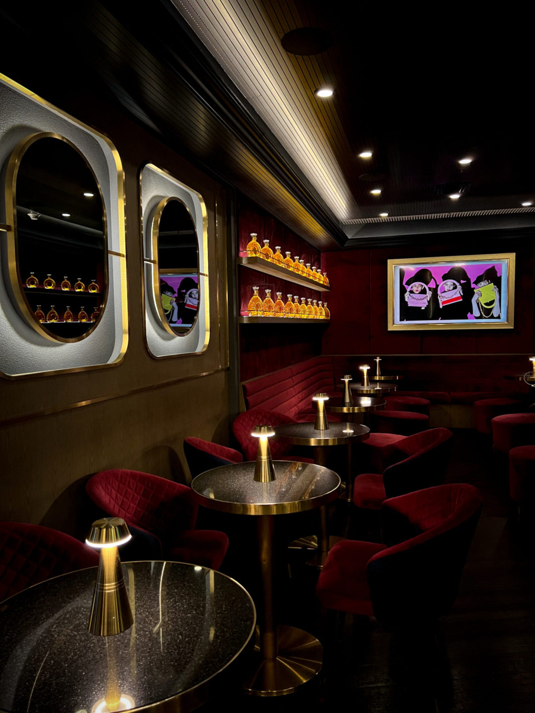 The gold, red and dimly-lit interior of Next Door Cafe