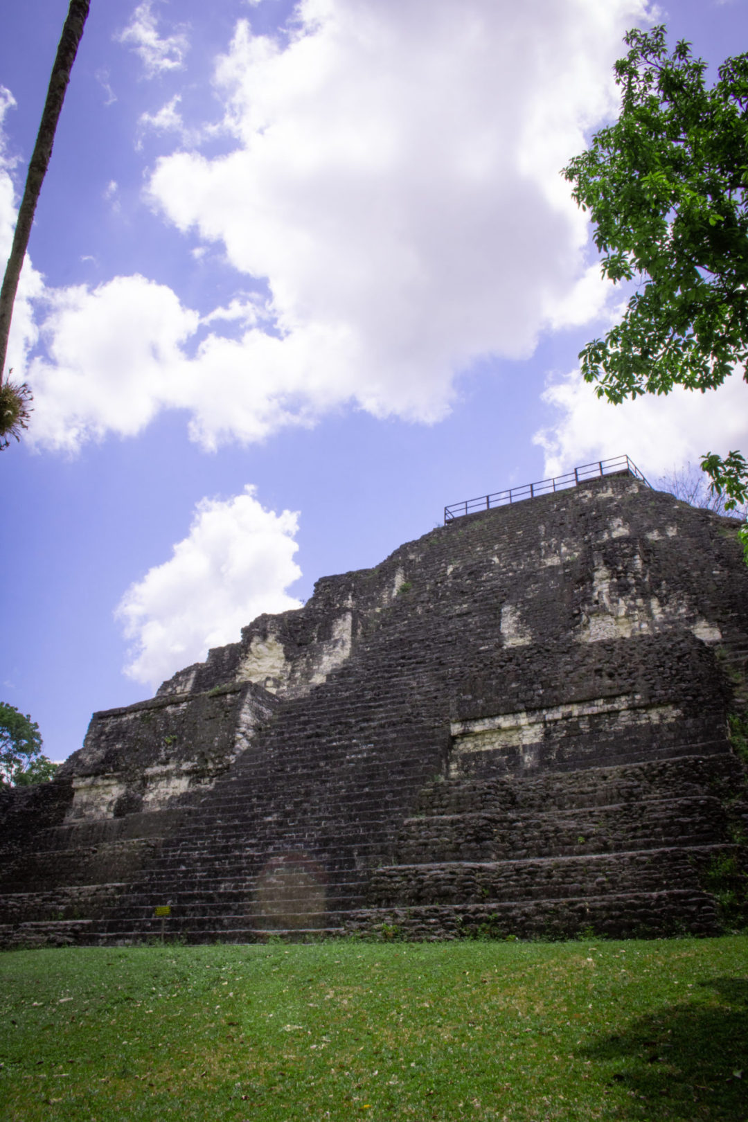 A large climbable pyramid structure inside Tikal National Park