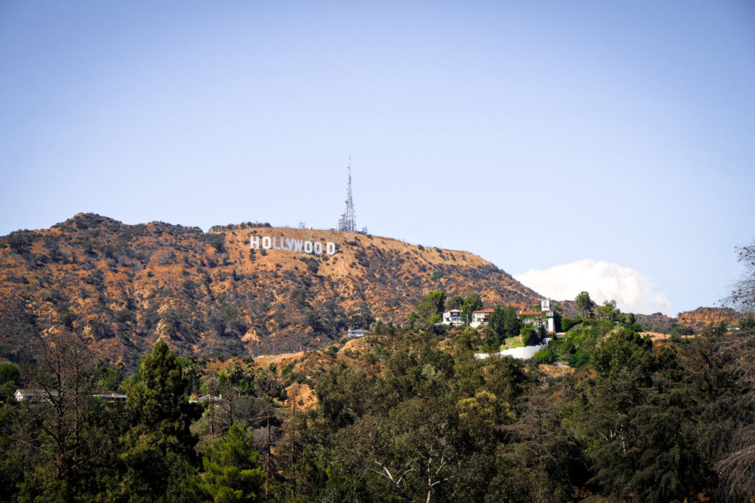 The view of the Hollywood sign from the Hollywood Reservoir