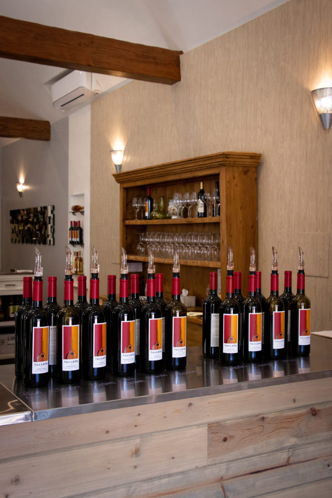 The wine pouring line-up inside the Toccata Tasting Room in Solvang California
