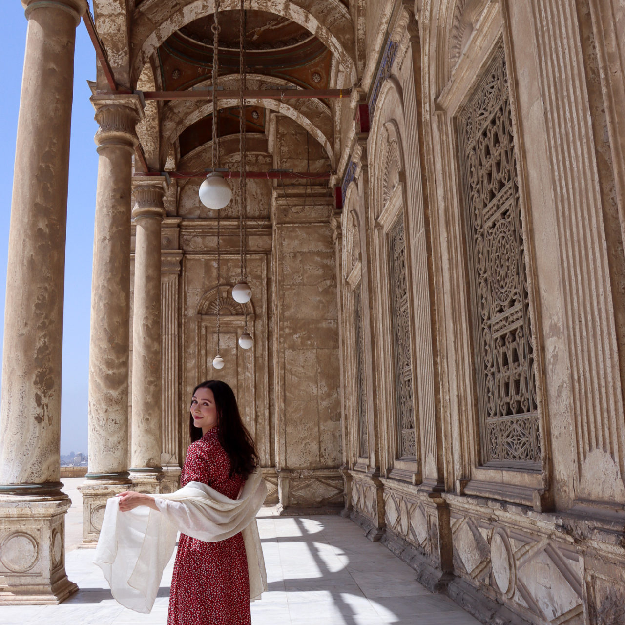 Jordan Gassner walking a corridor outside of one of the must-see Cairo mosques - the Alabaster Mosque