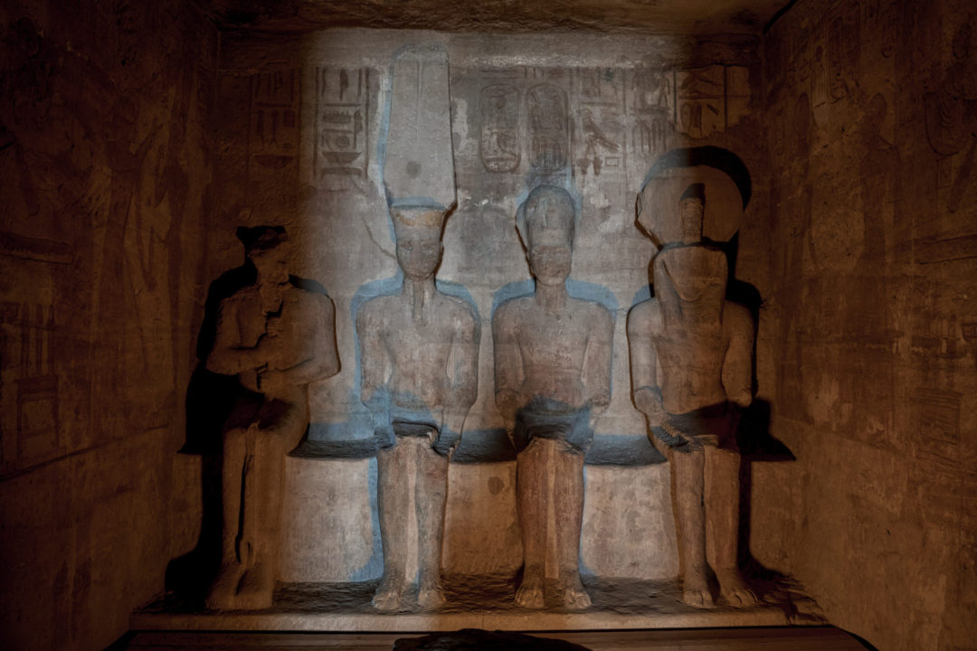 Sunlight shining onto the Inner Sanctuary of The Great Temple of Abu Simbel Temple in Egypt