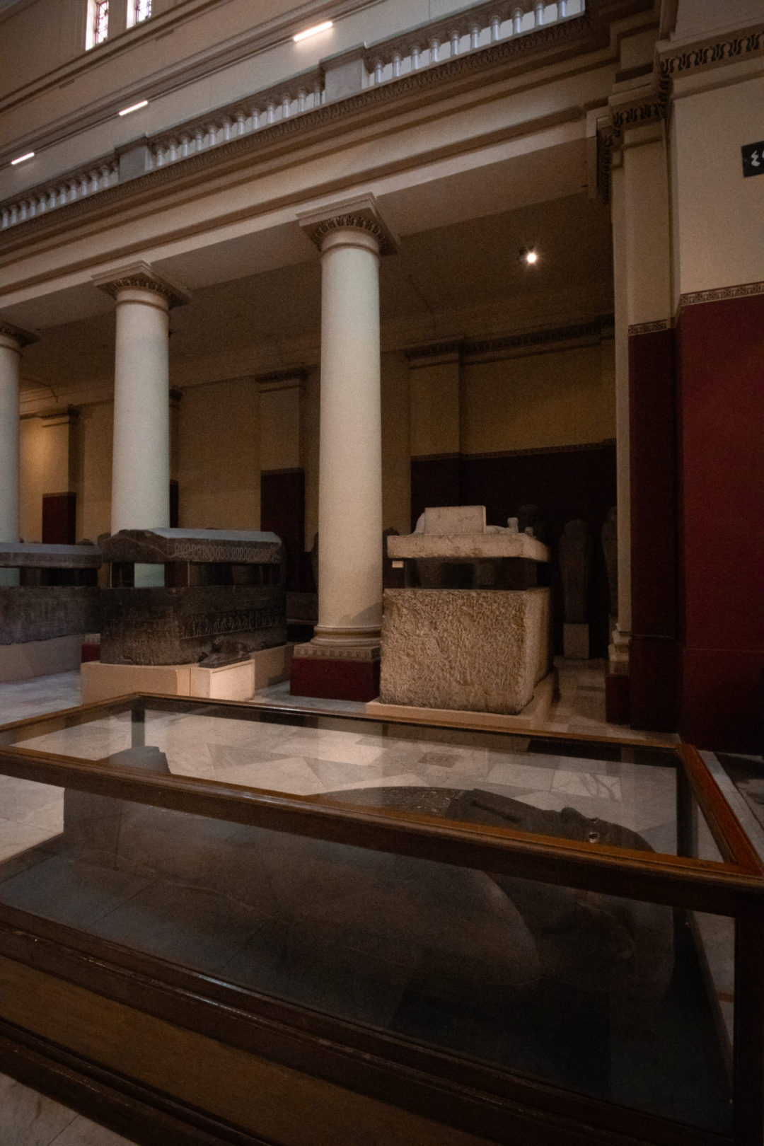 A row of ancient Egyptian sarcophagi inside Cairo's Egyptian Museum of Antiquities