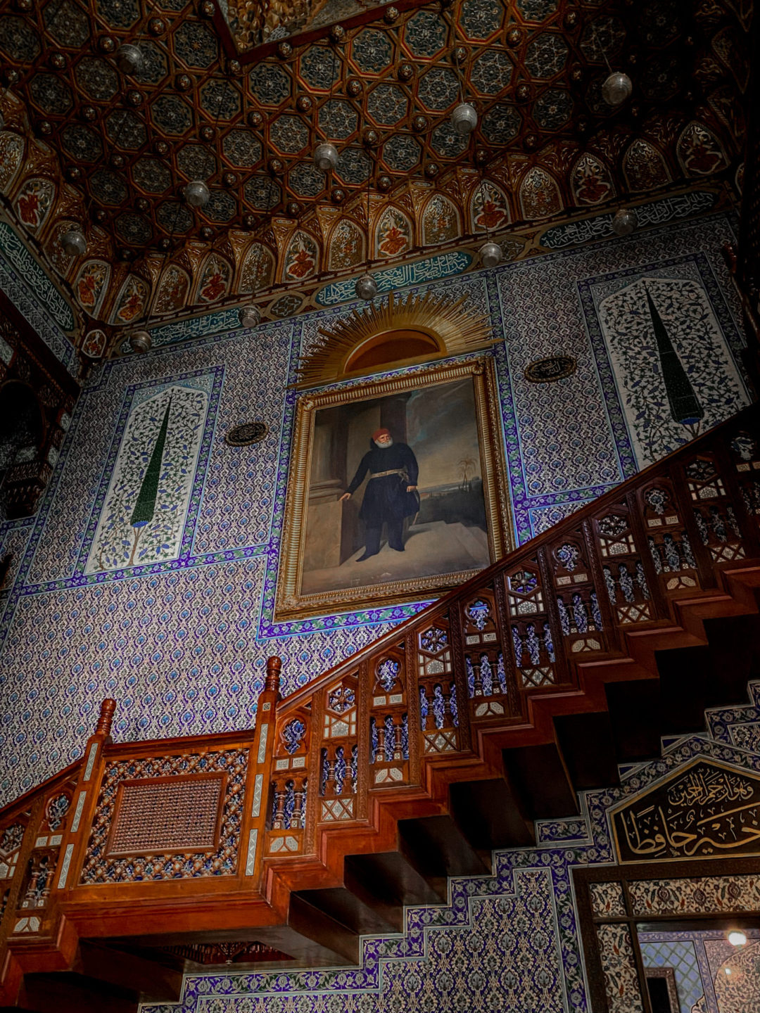 A wooden staircase inside Prince Mohamad Ali's Former Home at the Manial Palace Museum in Cairo, Egypt