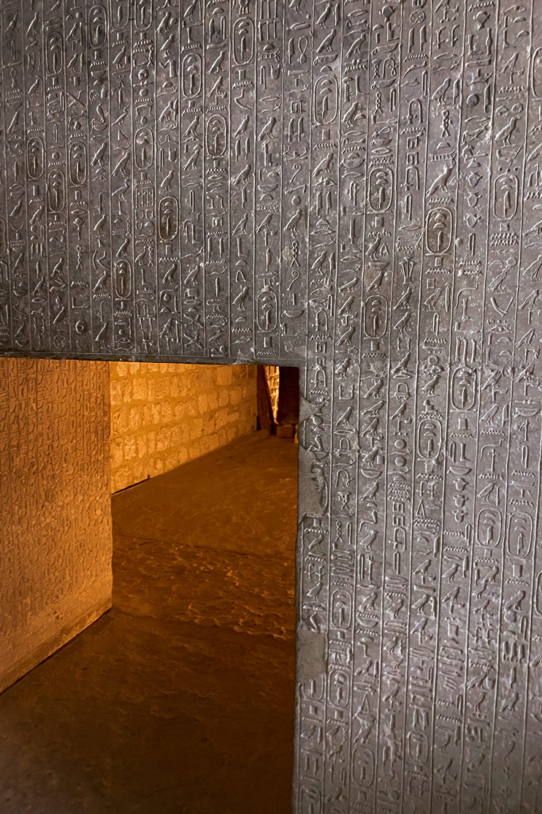 Hieroglyphics above a doorway leading into a small chamber inside the Pyramid of Unas on the Saqqara Necropolis in Egypt