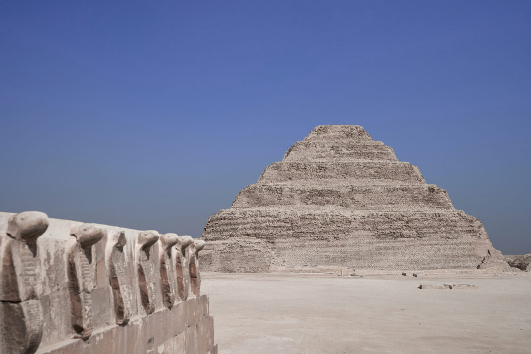 The Mummy Travel Guide: A frieze of cobras on top of the Southern Tomb of King Djoser in Egypt