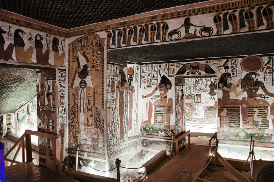 Colorful blue and gold hieroglyphics inside the Tomb of Queen Nefertari in Egypt's Valley of the Queens