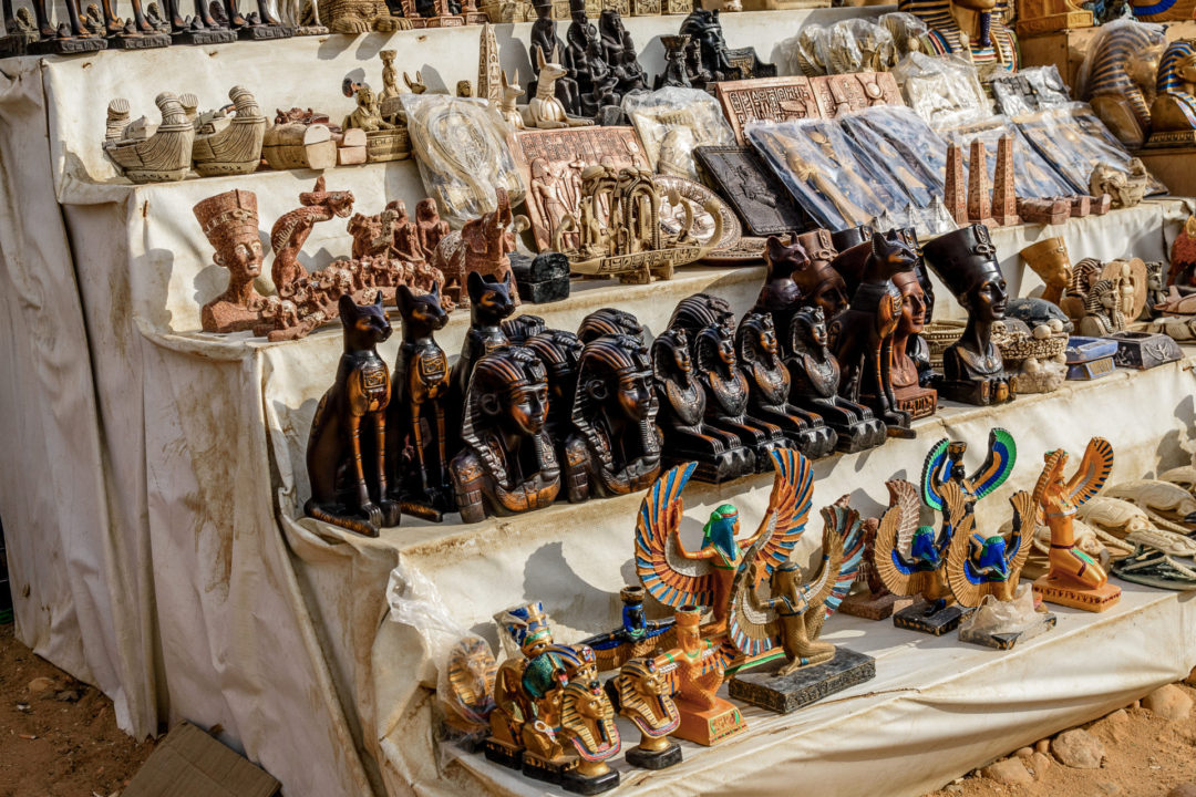 Different Egyptian-themed souvenirs for sale in street shop in Egypt