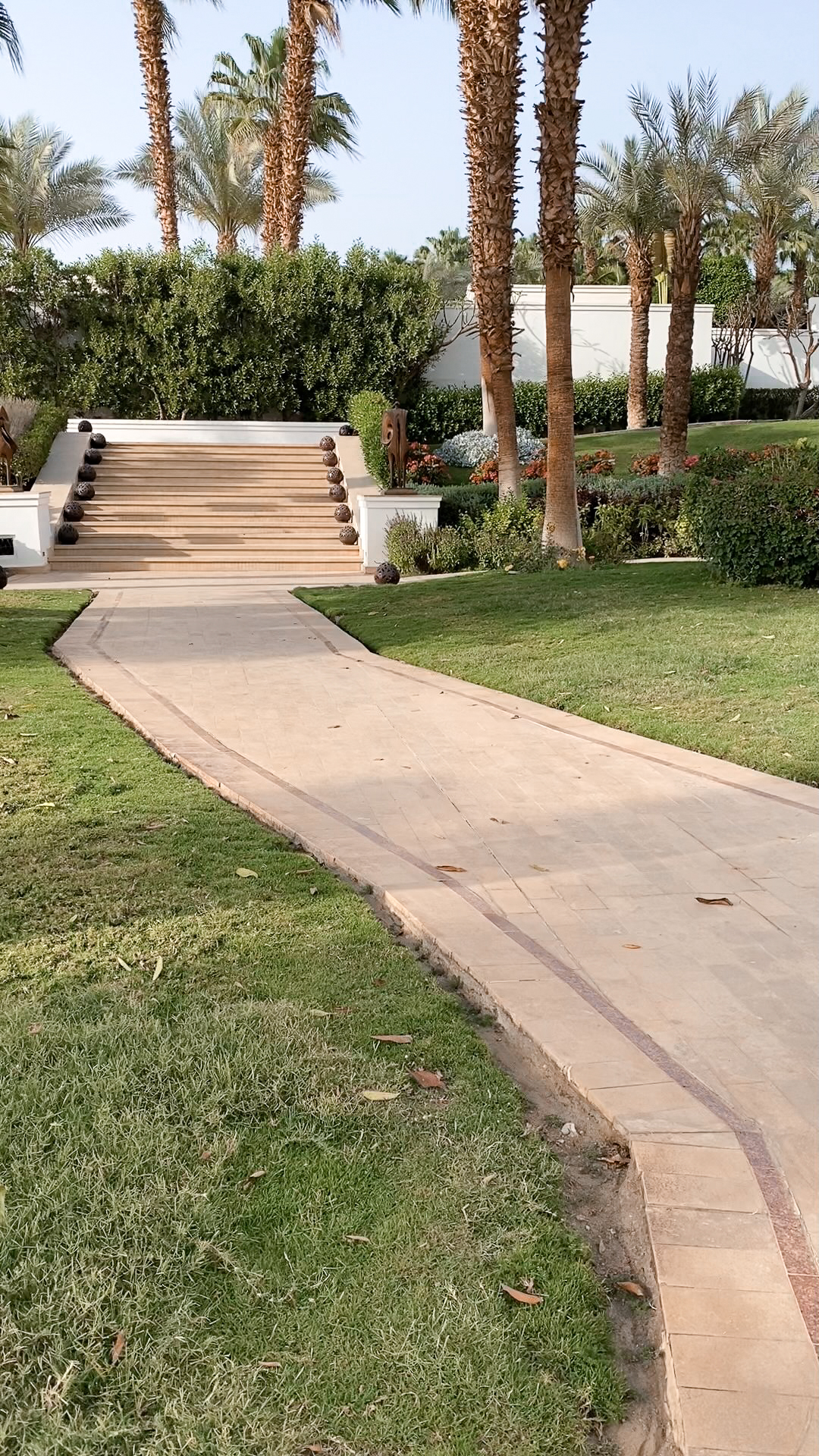 A walkway leading up a set of stairs to the spa at Hilton Luxor