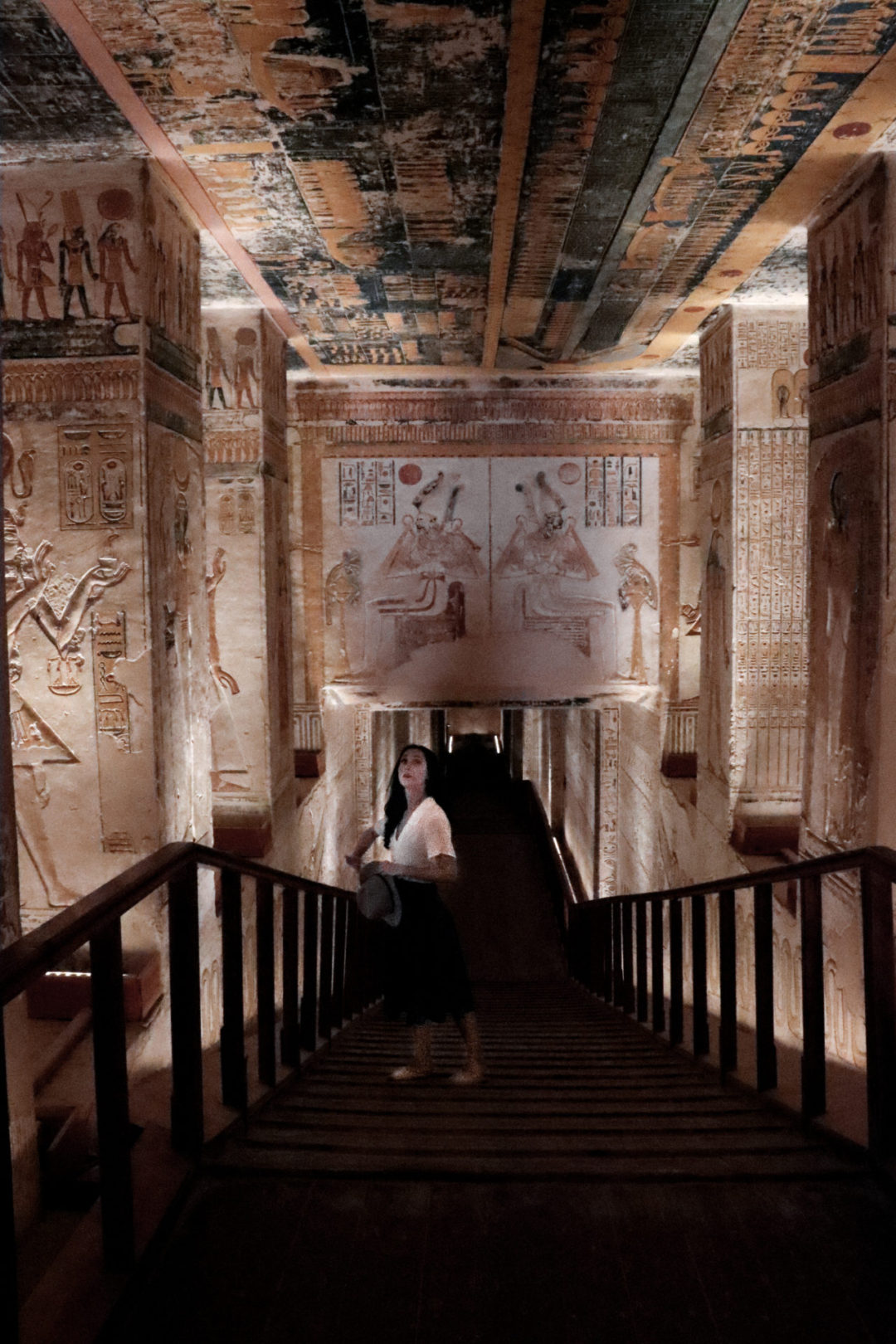 Travel Blogger Jordan Gassner looking up at the hieroglyphs inside a walkway of Egypt's KV9 Tomb in Valley of the Kings