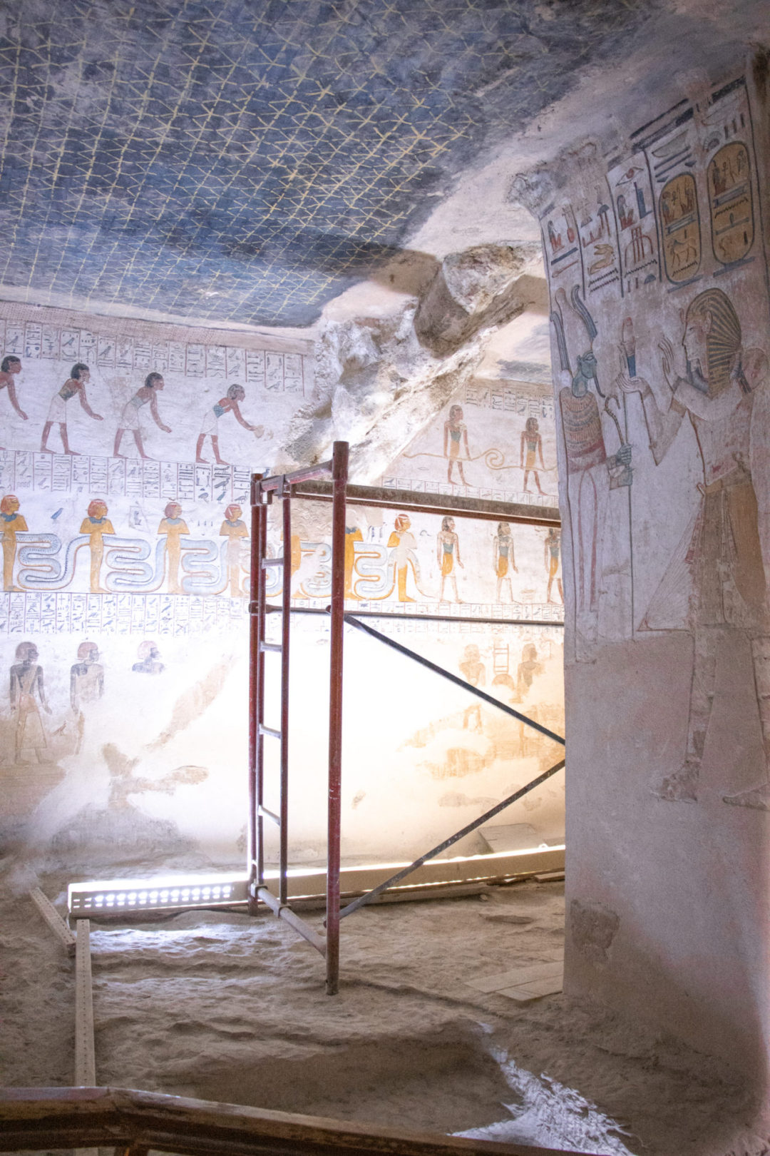 Scaffolding next to vibrant hieroglyphs inside the Tomb of Merenptah in Valley of the Kings in Luxor, Egypt