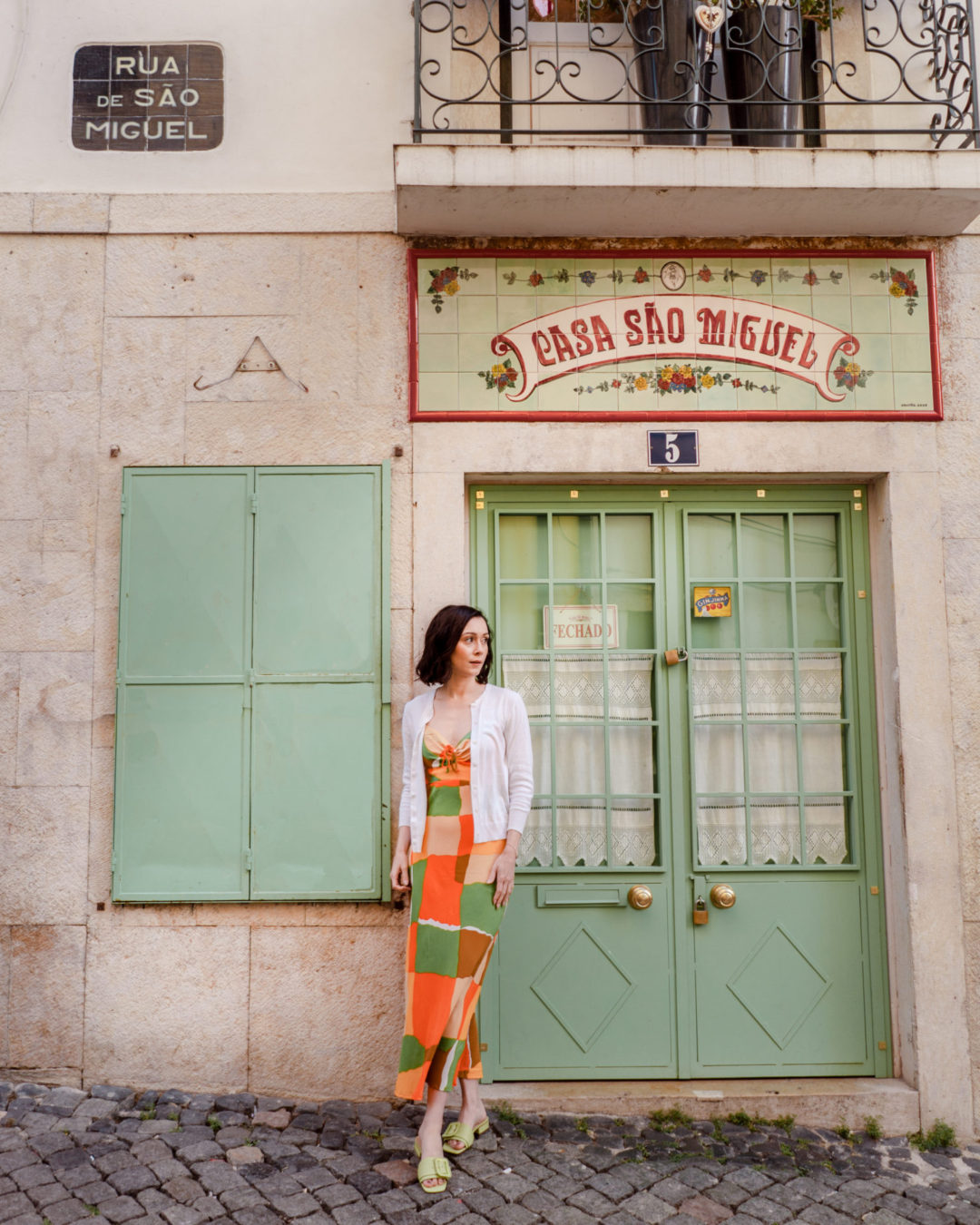 Travel Blogger Jordan Gassner standing outside Casa São Miguel in Lisbon, Portugal