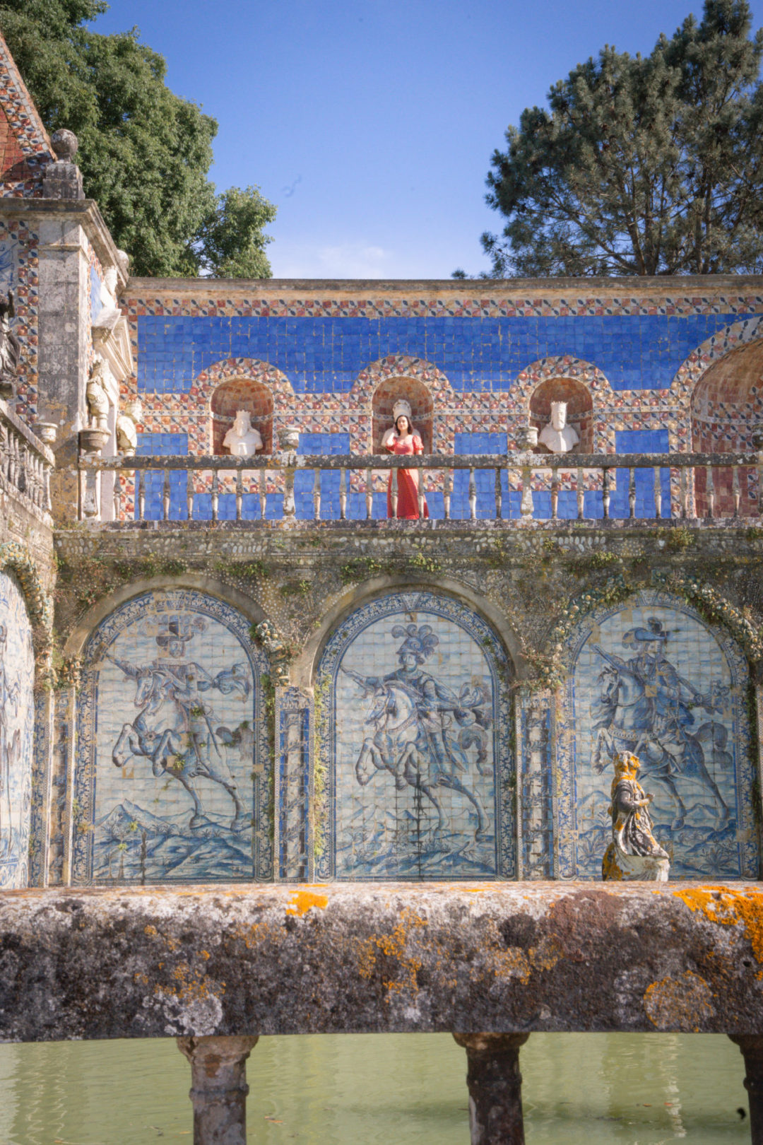 Travel Blogger Jordan Gassner standing on top of the Galeria das Artes Terrace inside the Palace Fronteira Gardens in Lisbon, Portugal