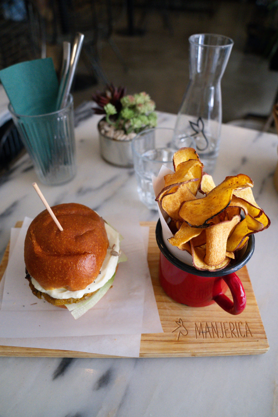 The dairy-free Portugal Cheeseburger and sweet potato fries from Manjerica, a Lisbon restaurant cooking up vegan cuisine
