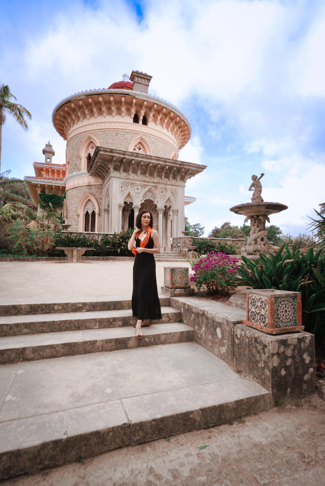 Travel Blogger Jordan Gassner smiling in front of Monserrate Palace in Sintra, Portugal