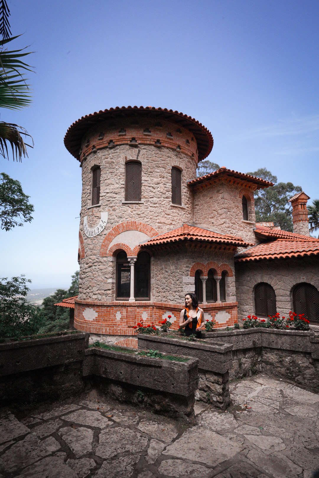 Travel Blogger Jordan Gassner smiling in front of Villa Sassetti in Sintra, Portugal