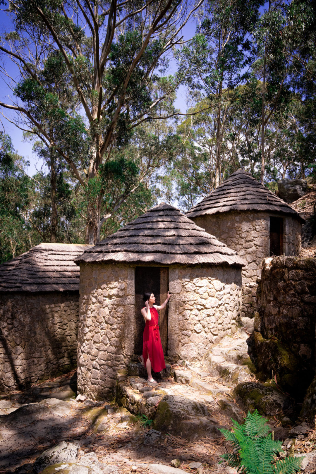 Princess Bride Travel Aesthetic: Travel Blogger Jordan Gassner peering out from Castro de São Lourenço