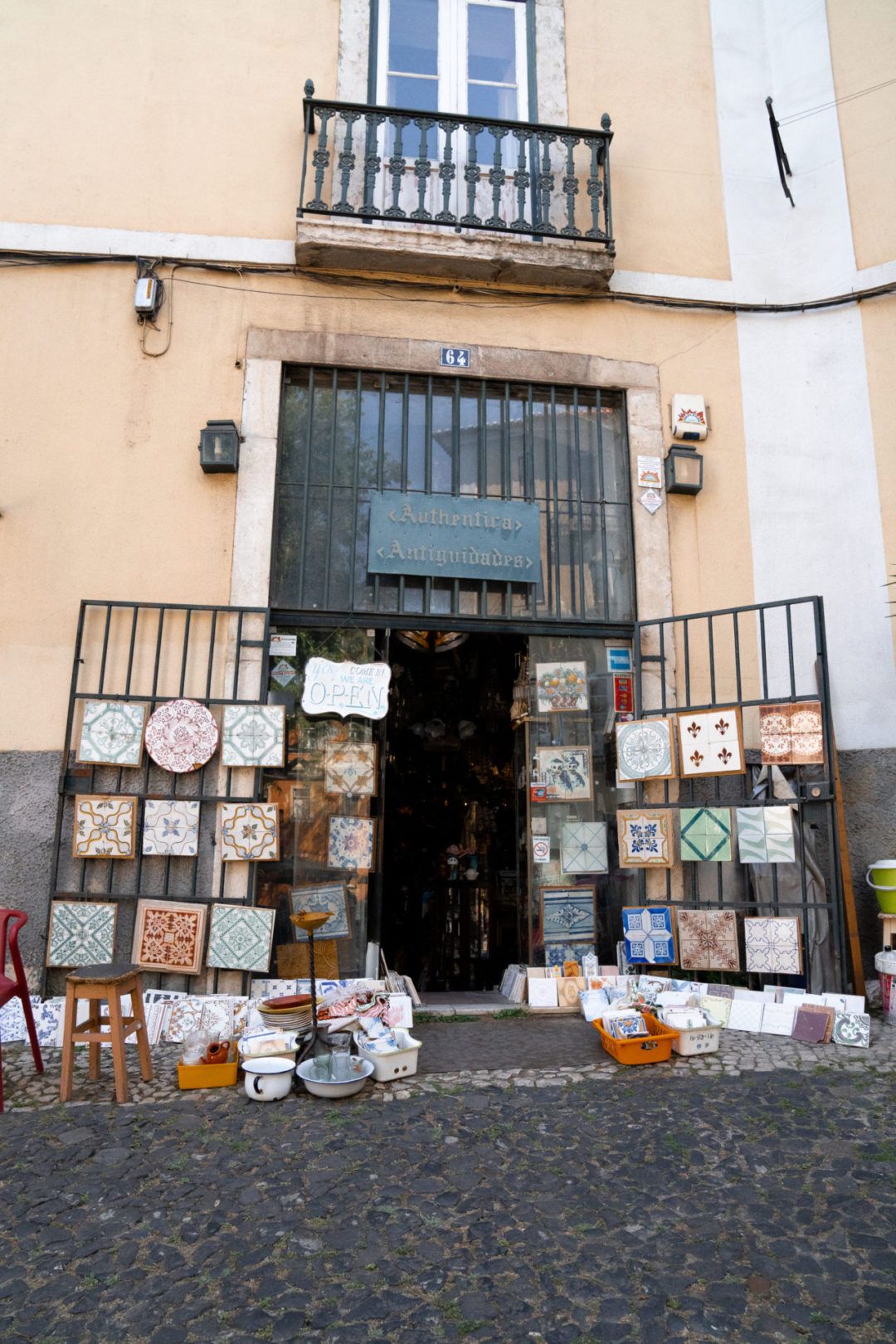 The exterior of Authentica Antiguidades, a vintage tile store in the heart of Lisbon, Portugal