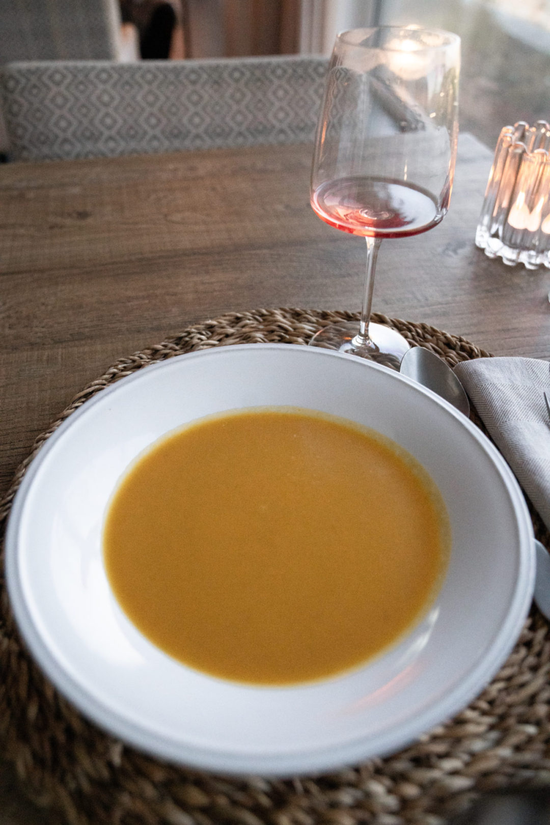 A sweet potato soup and glass of rose wine from O Comendador Restaurant inside Lamego Hotel & Life in Portugal