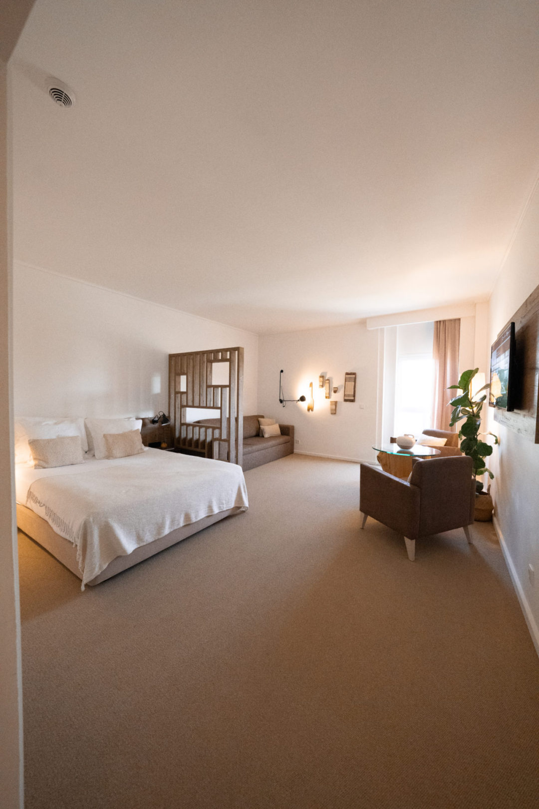 The full bedroom-living space inside one of Lamego Hotel & Life's Superior Rooms with a Valley View