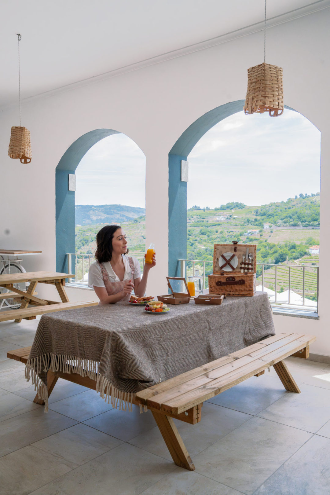 Travel Blogger Jordan Gassner enjoying a picnic in Portugal's Douro Valley at Lamego Hotel and Life