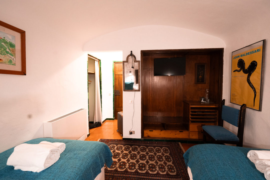 The bedroom inside the Manuel Amador room in Torre De Maneys Hotel in Obidos, Portugal