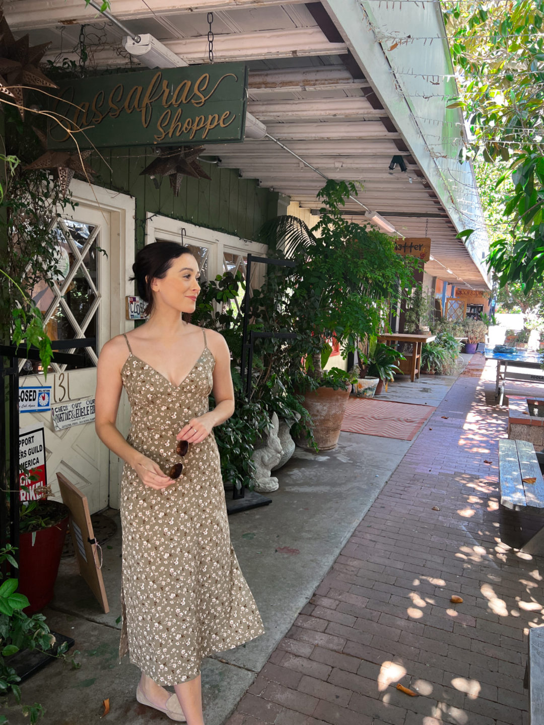 Travel Blogger Jordan Gassner looking at a nearby shop in Topanga Center, an outdoor shopping mall in Topanga Canyon, California