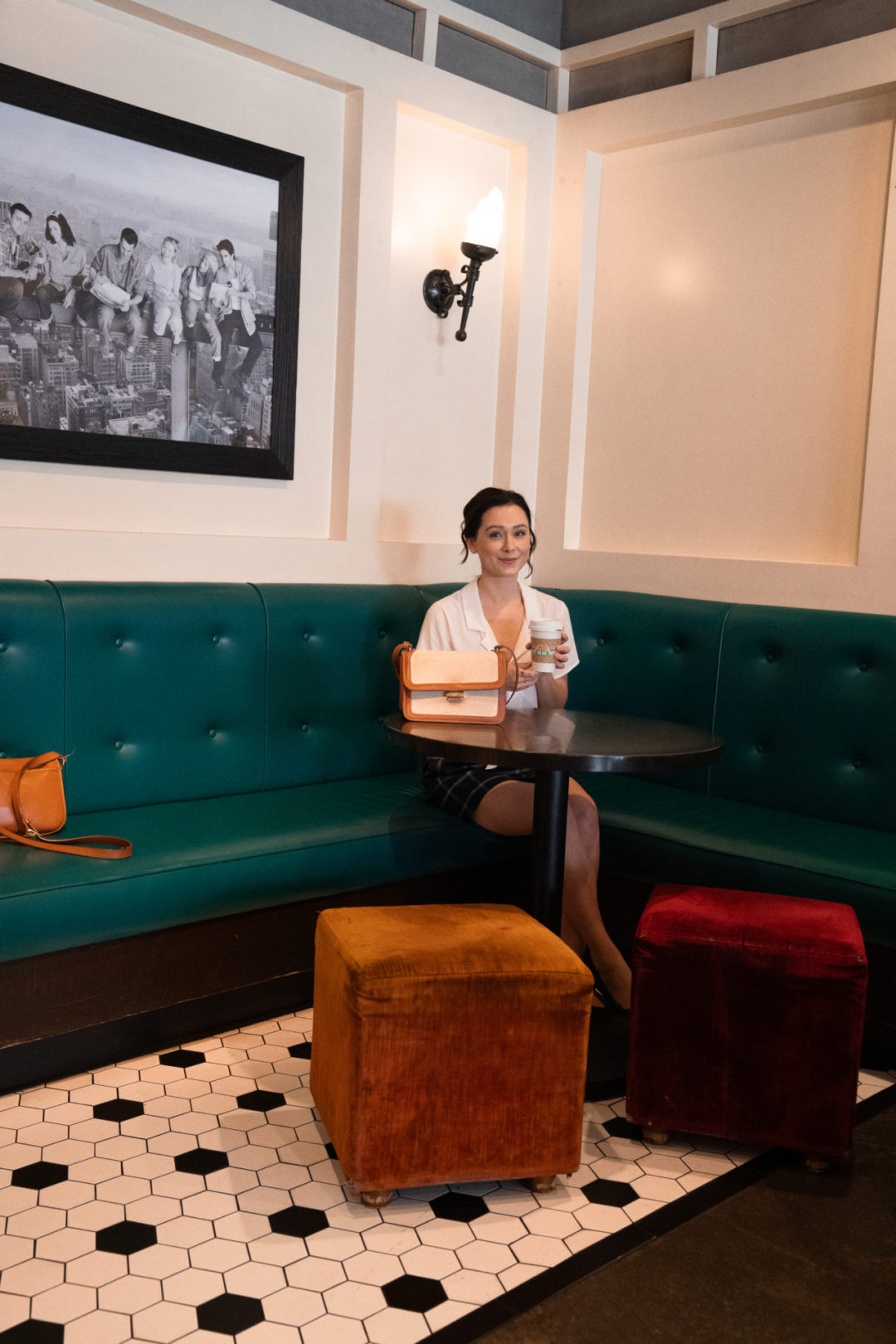 Travel Blogger Jordan Gassner enjoying a cup of tea inside Central Perk Cafe on the Warner Bros. Studio Lot in Burbank, California, USA