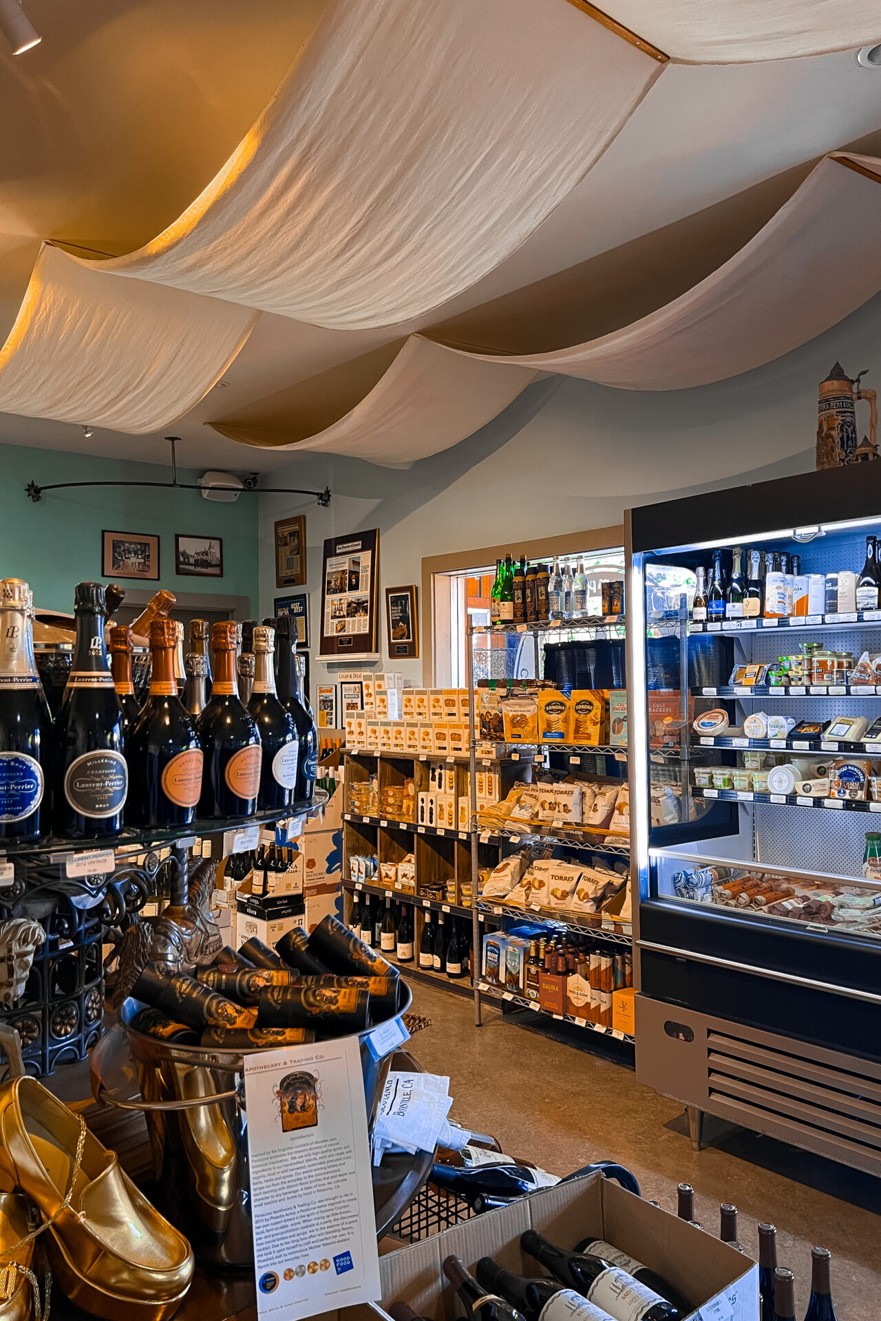 The interior of Disco Ranch, full of shelves with wine, artisanal foods and more in Boonville town located in California's Anderson Valley