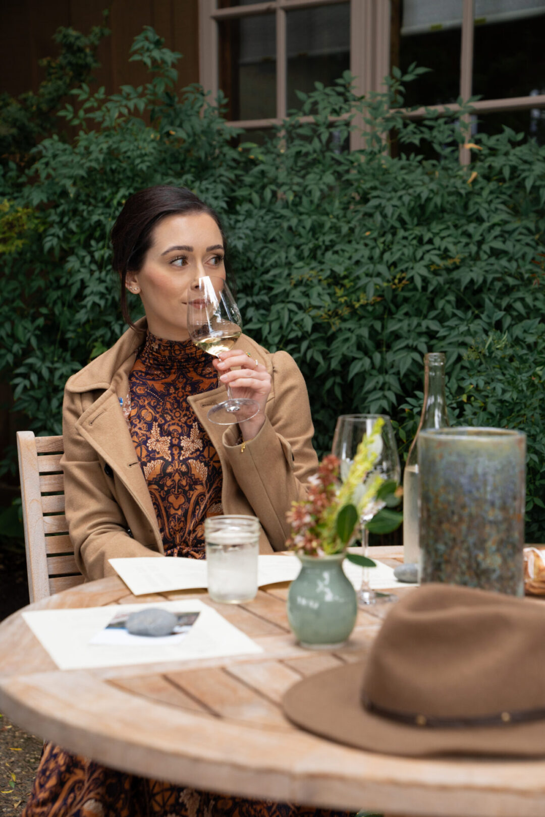 Travel Blogger Jordan Gassner smelling a glass of white wine at Handley Cellars in Anderson Valley, California