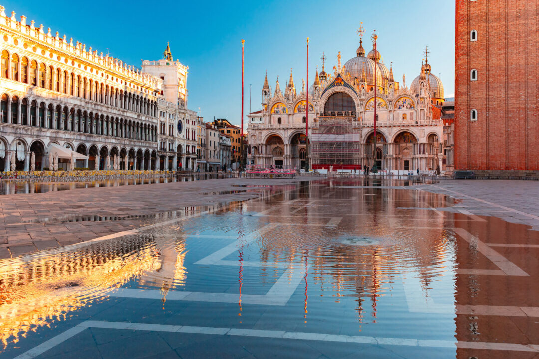 Saint Mark's Square in Venice, Italy under acqua alta at sunrise