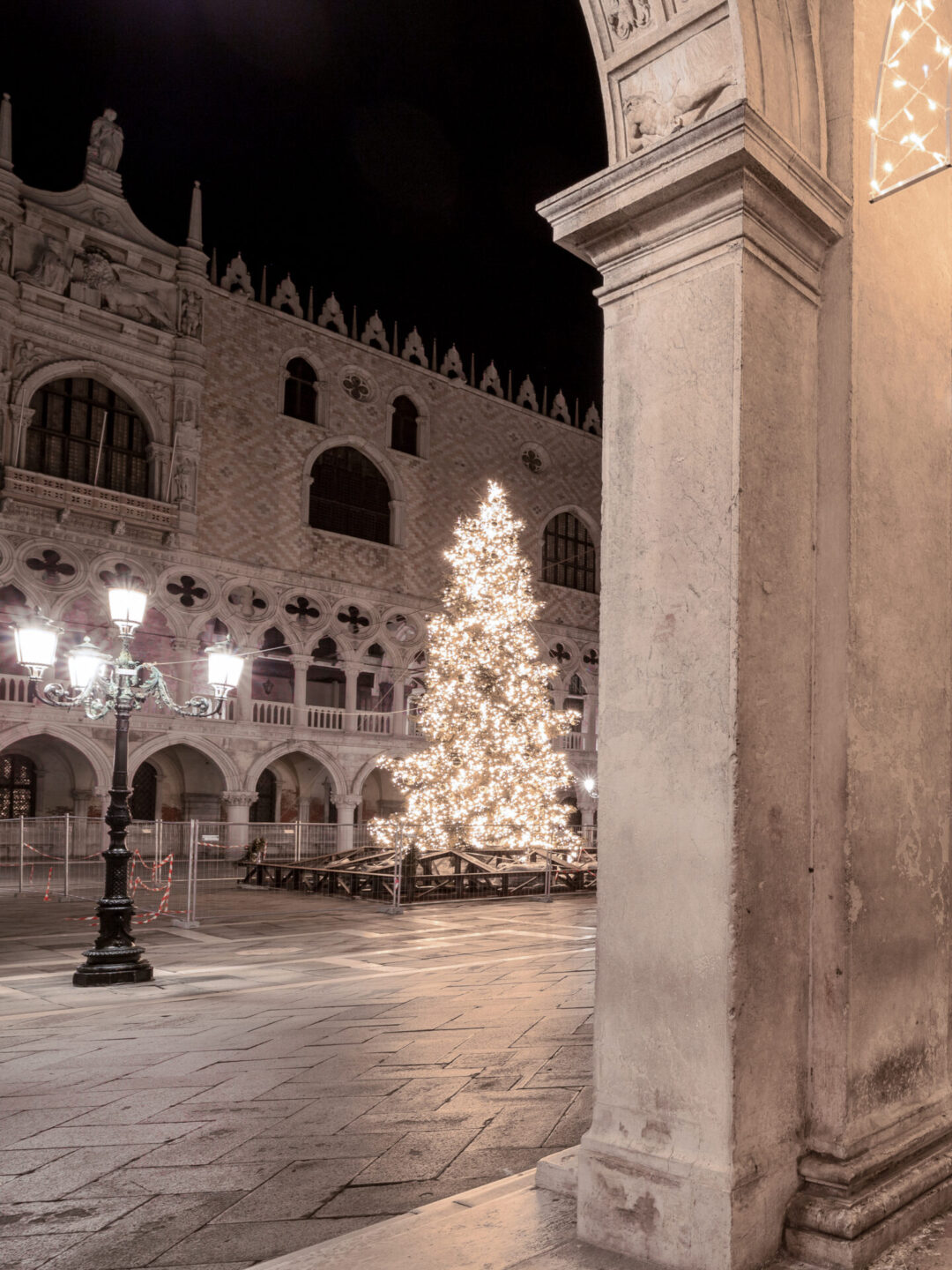 The Christmas Tree in the middle. ofSaint Marks Square at night in Venice, Italy