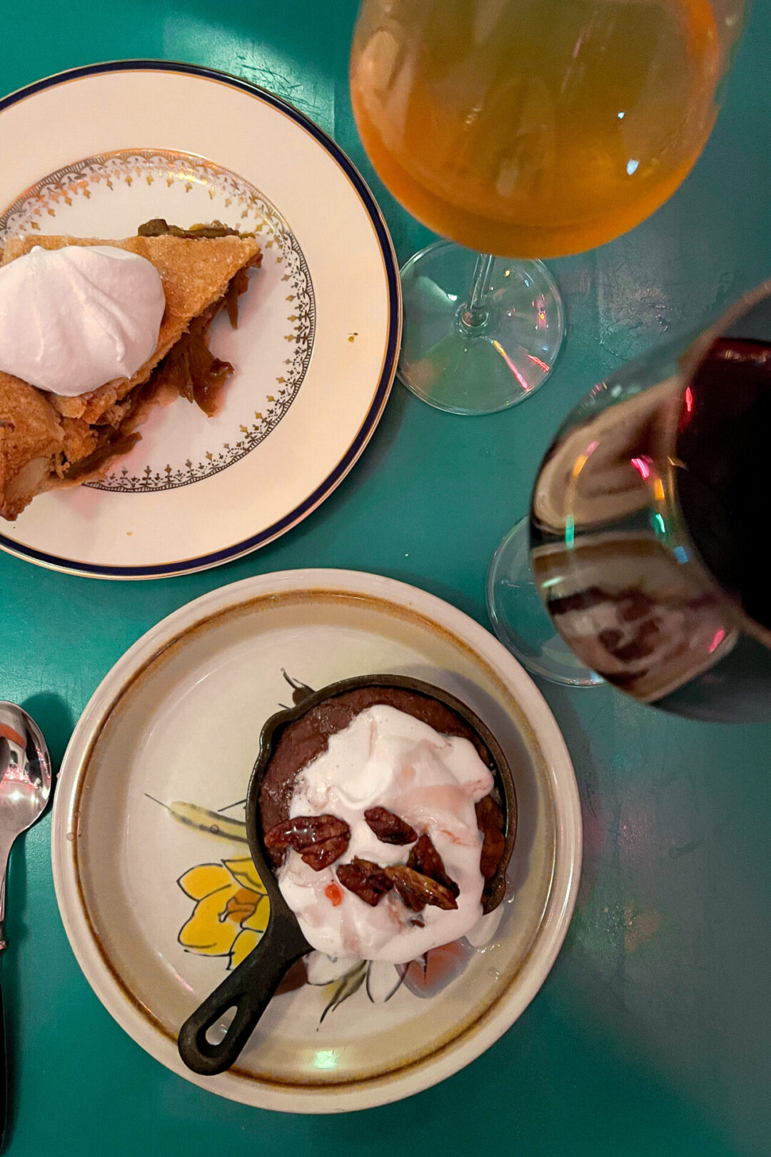 A dessert pie and a chocolate mug cookie and two glasses of wine from Fog Eater Cafe in Mendocino, California