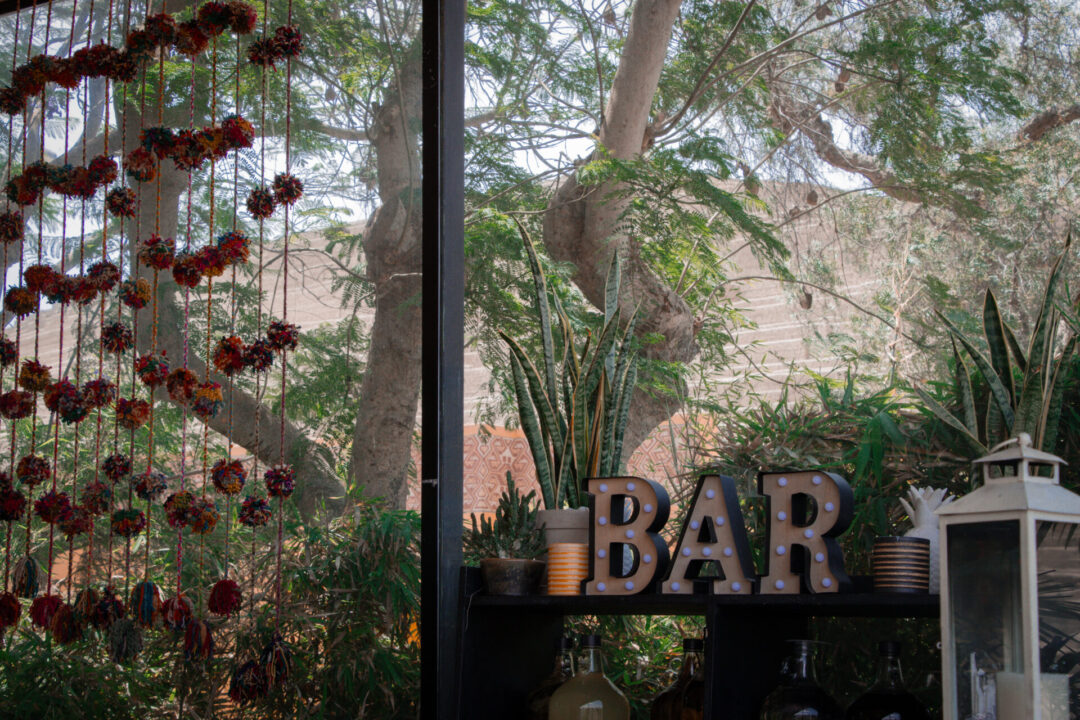 Some of the decor and a "BAR" sign at Huaca Pucllana restaurant in Lima, Peru