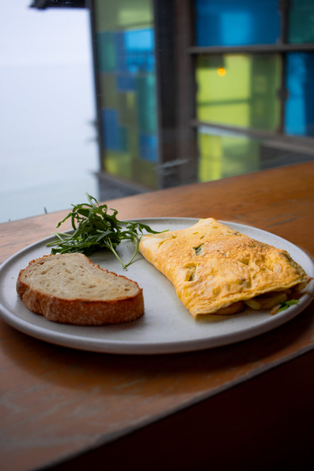 An omelette and side of toast from Popular a restaurant overlooking the Pacific Ocean in Lima, Peru